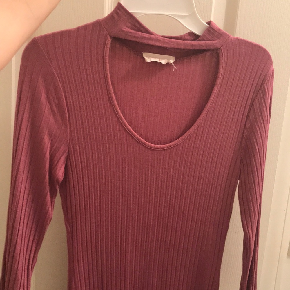 Pink long sleeved blouse